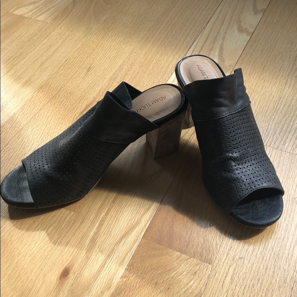 Black leather open toe heeled shoes